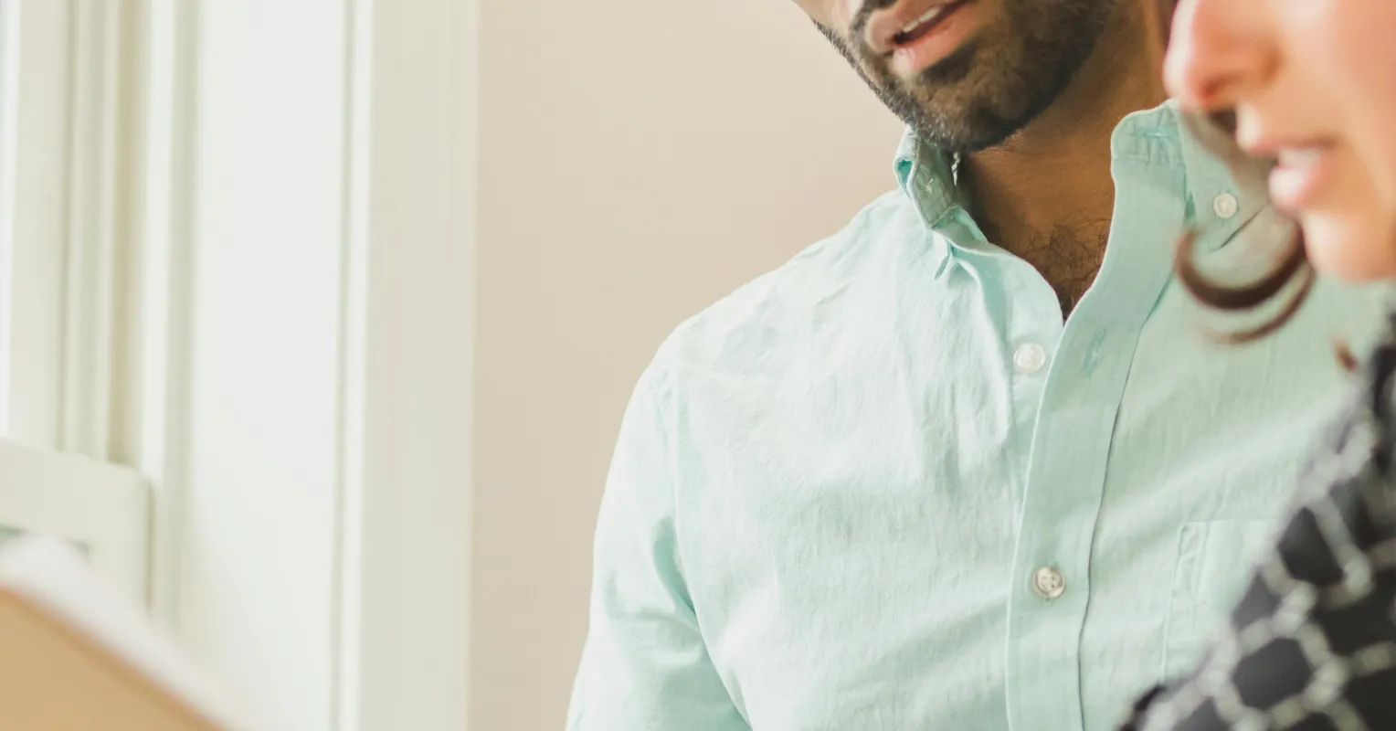 Individual contemplating uncertainty in a relationship, questioning partner's feelings