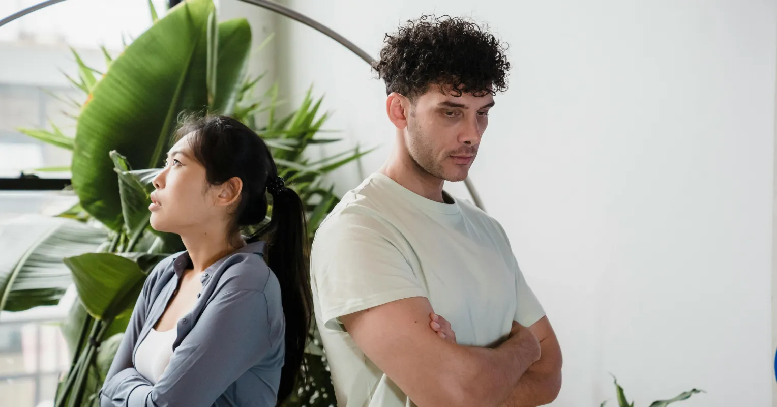Person reflecting on uncertainty in a relationship connected to my partner avoids discussing our intimate connection