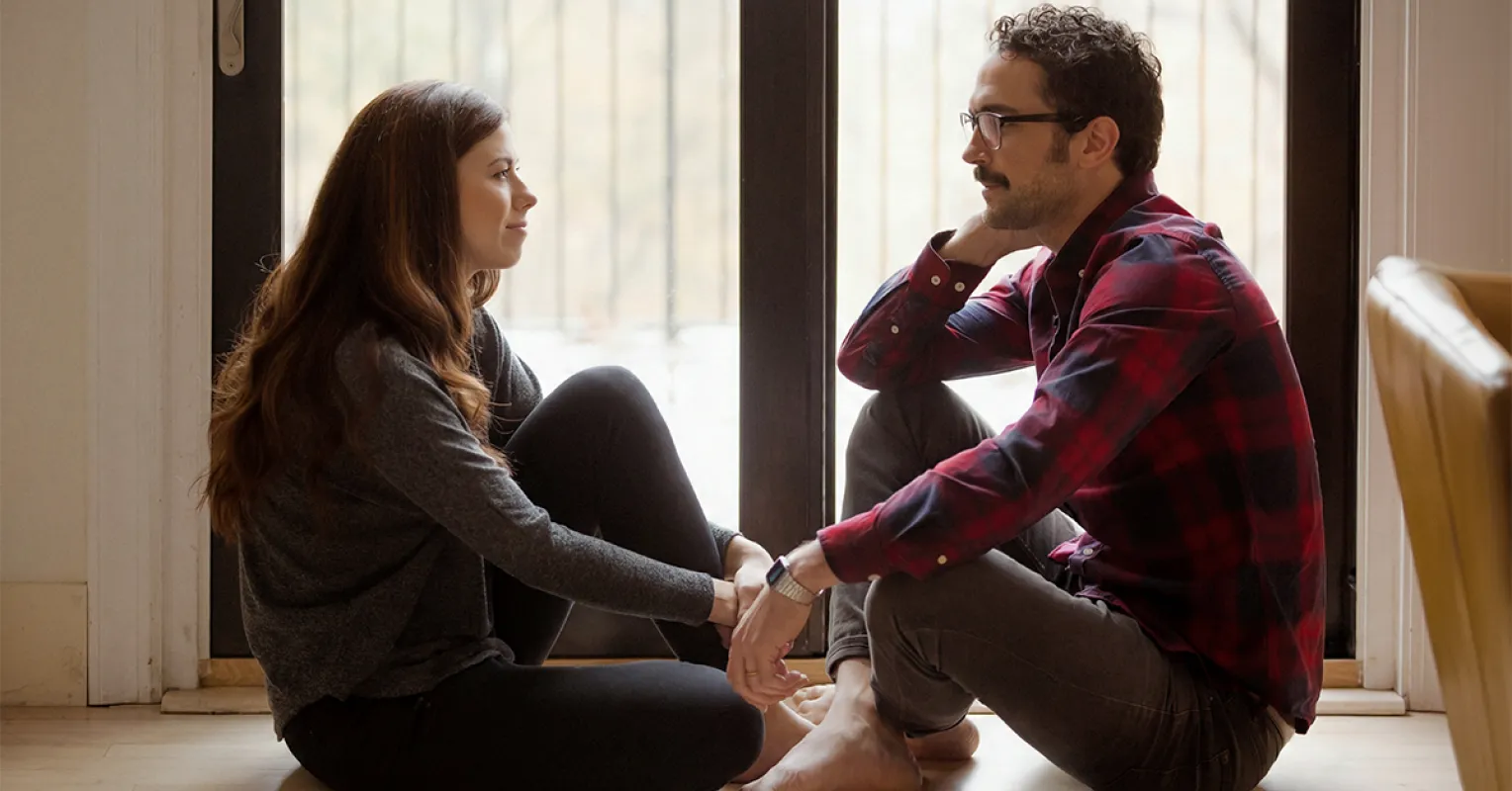Couple experiencing emotional withdrawal after a period of closeness and intimacy