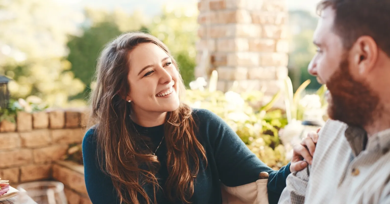 Person reflecting on uncertainty in a relationship connected to what happens when partners stop complimenting each other