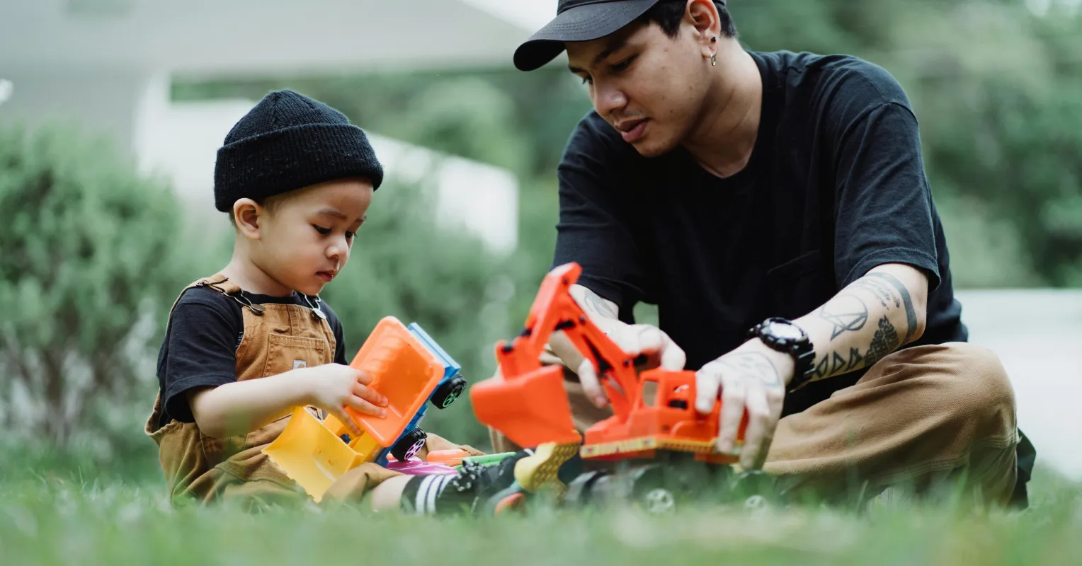 Two stepchildren showing reluctance to engage in play, reflecting emotional resistance in family dynamics.