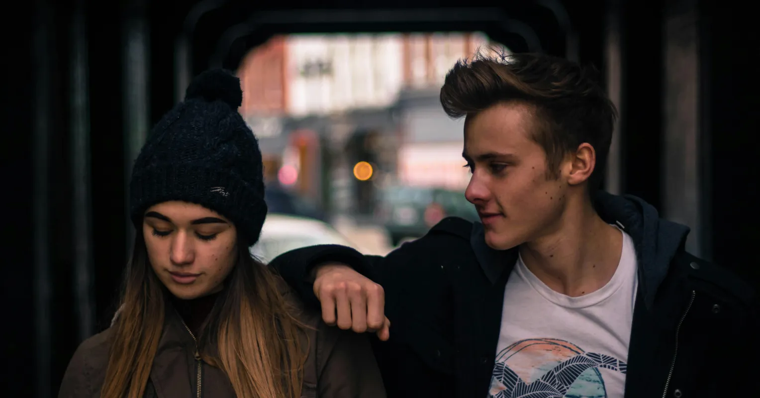 Couple navigating emotional distance after arguments, exploring intimacy signals