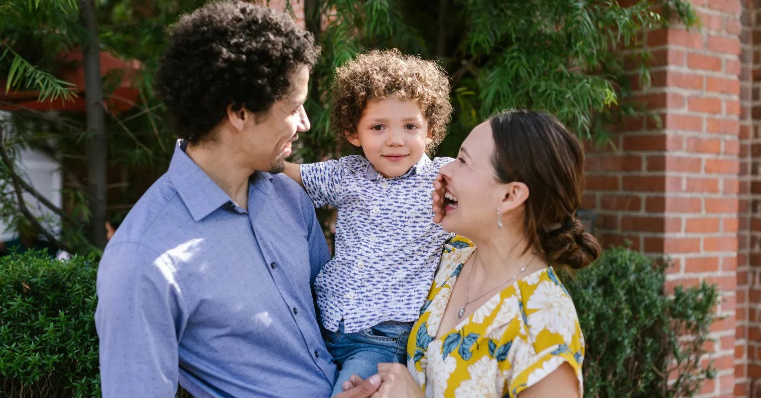 Stepparent observing a distant stepchild, highlighting complex relationship signals.
