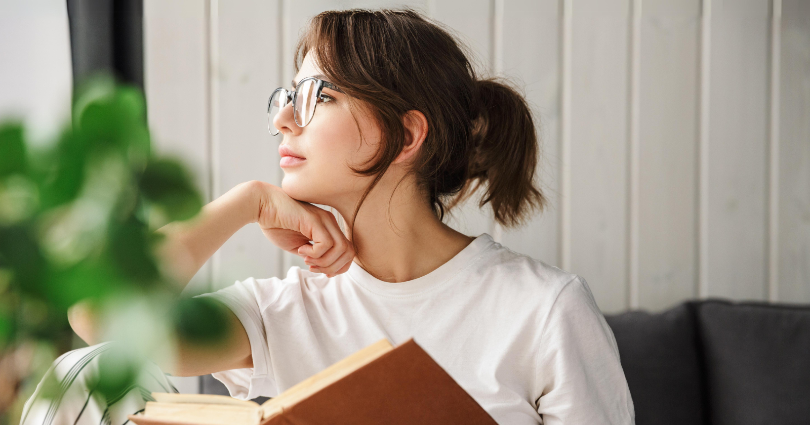 A person listening intently in a conversation, showcasing quiet engagement and social dynamics.
