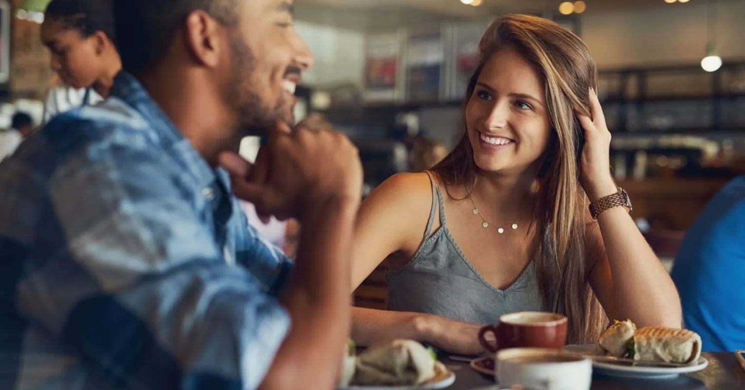 Individual contemplating relationship signals after a tentative follow-up from a date