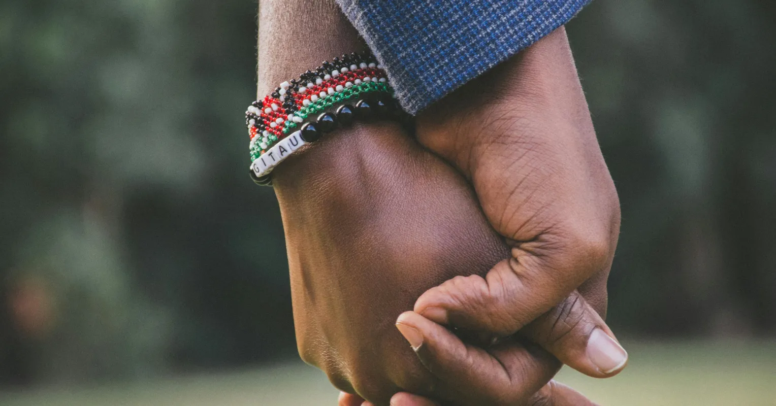 Couple sitting in silence, reflecting on unspoken relationship needs and communication gaps