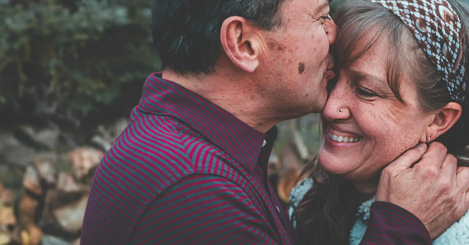Couple experiencing emotional disconnect as one partner ignores the other’s emotional bids