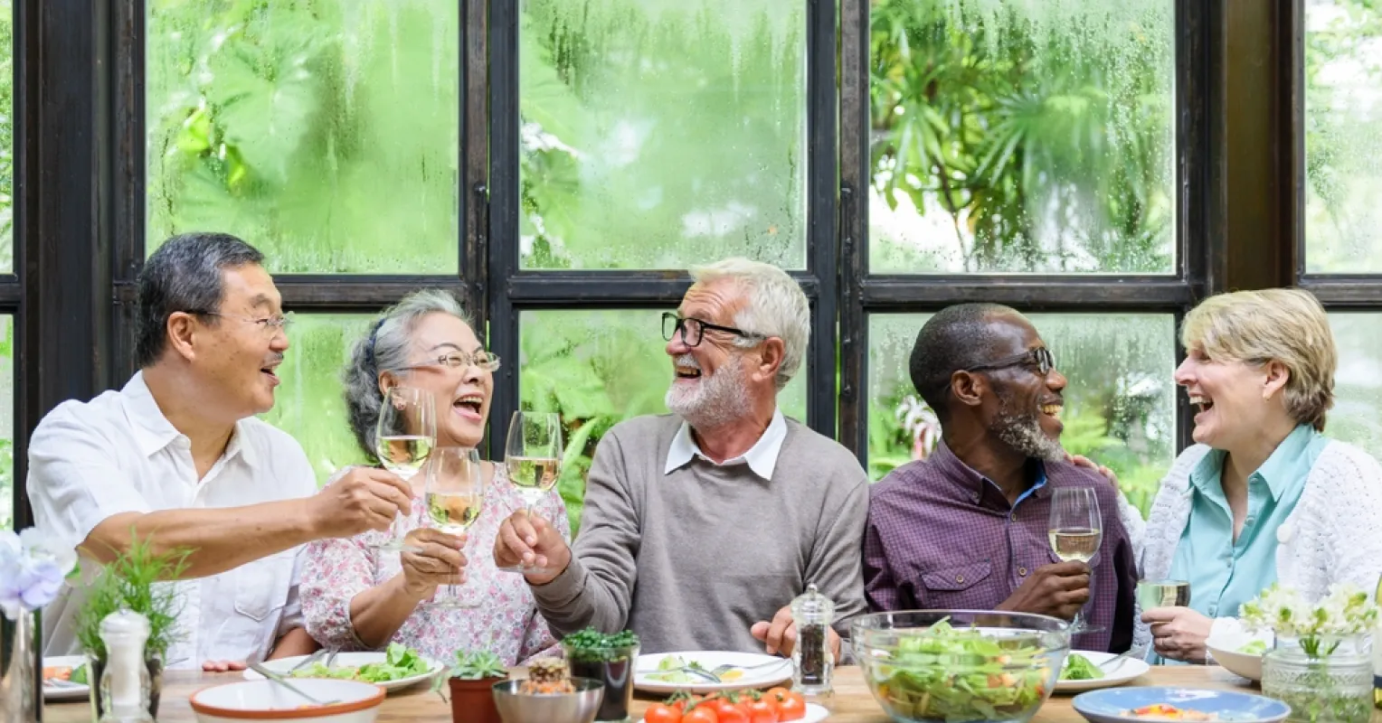 Grandparent looking concerned while interacting with an uncomfortable grandchild