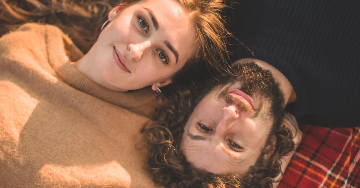 Couple sitting in silence, interpreting emotional signals in a relationship context