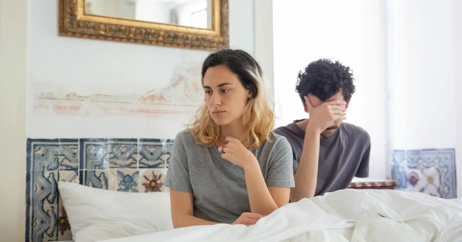 Couple discussing feelings of accountability after infidelity, illustrating relationship signals