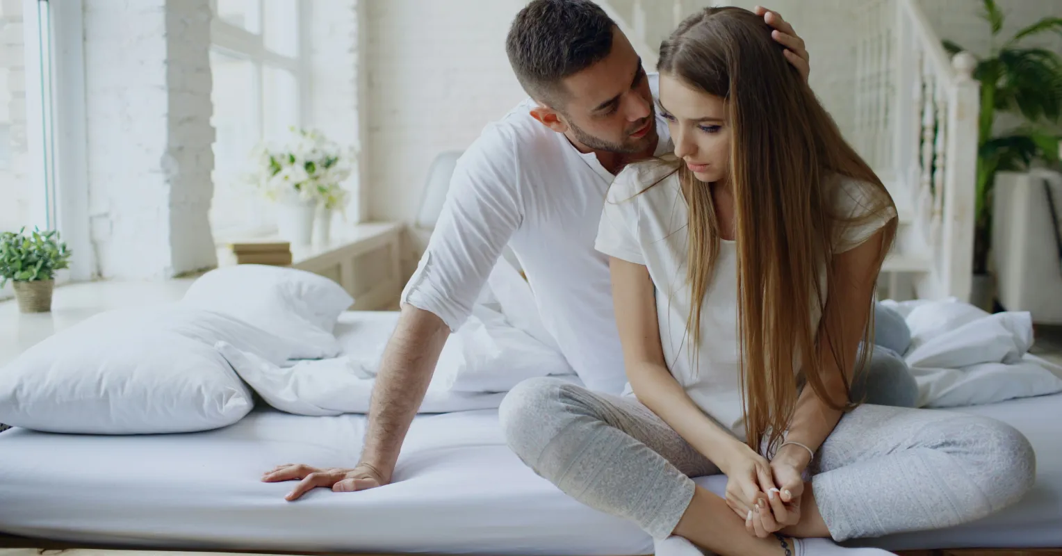 A couple discussing how to support each other during overwhelming anxiety moments.