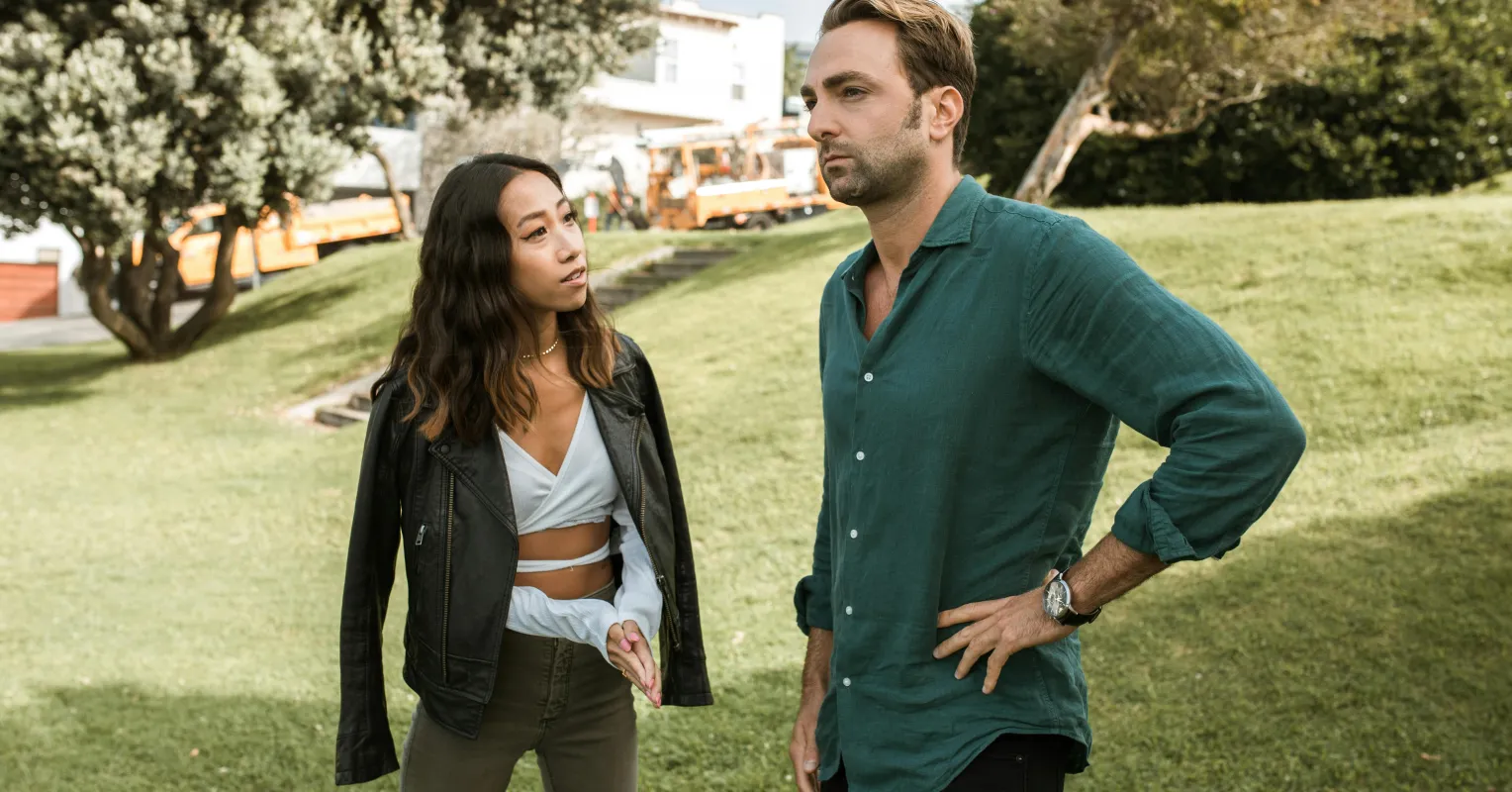 Individual contemplating feelings of guilt while setting boundaries in a close relationship