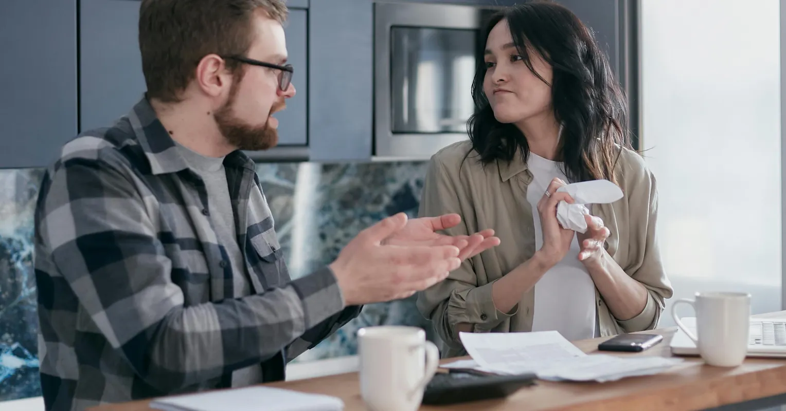 Individual contemplating guilt while establishing boundaries with a partner in a relationship
