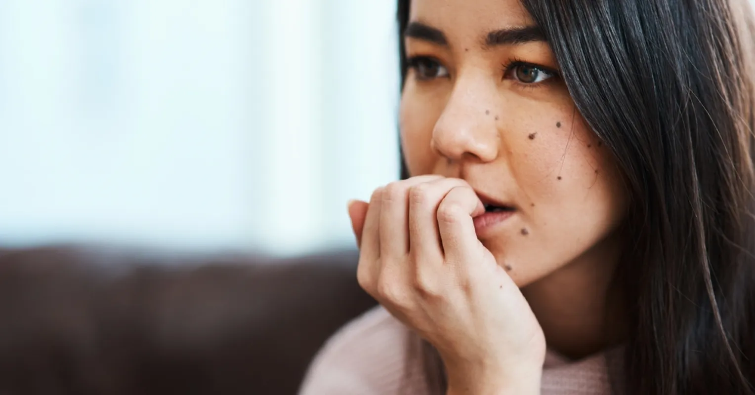 Individual feeling insecure despite their partner's comforting gestures and reassuring words