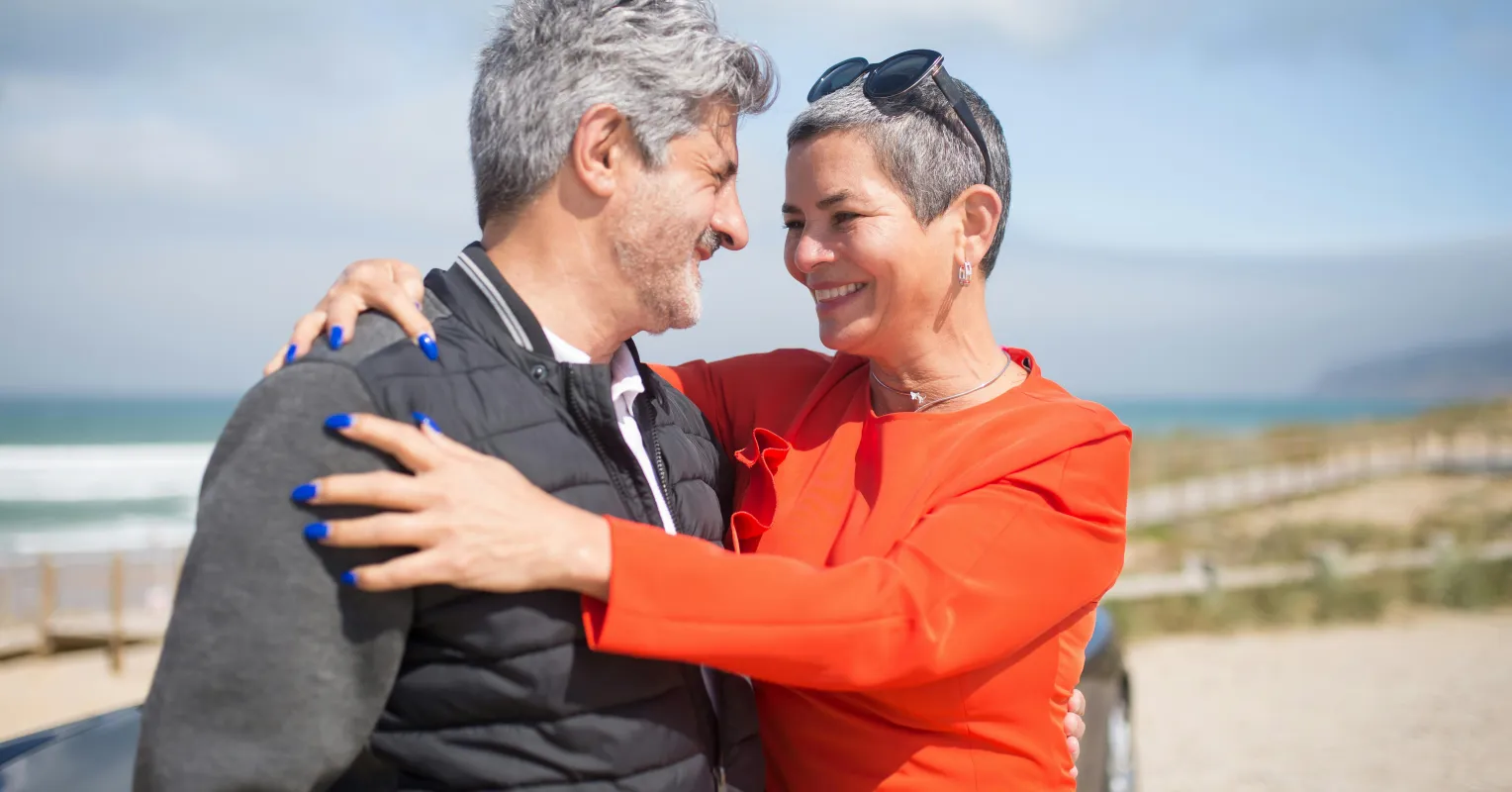 Couple sitting in silence, feeling a disconnect despite no arguments in their marriage.