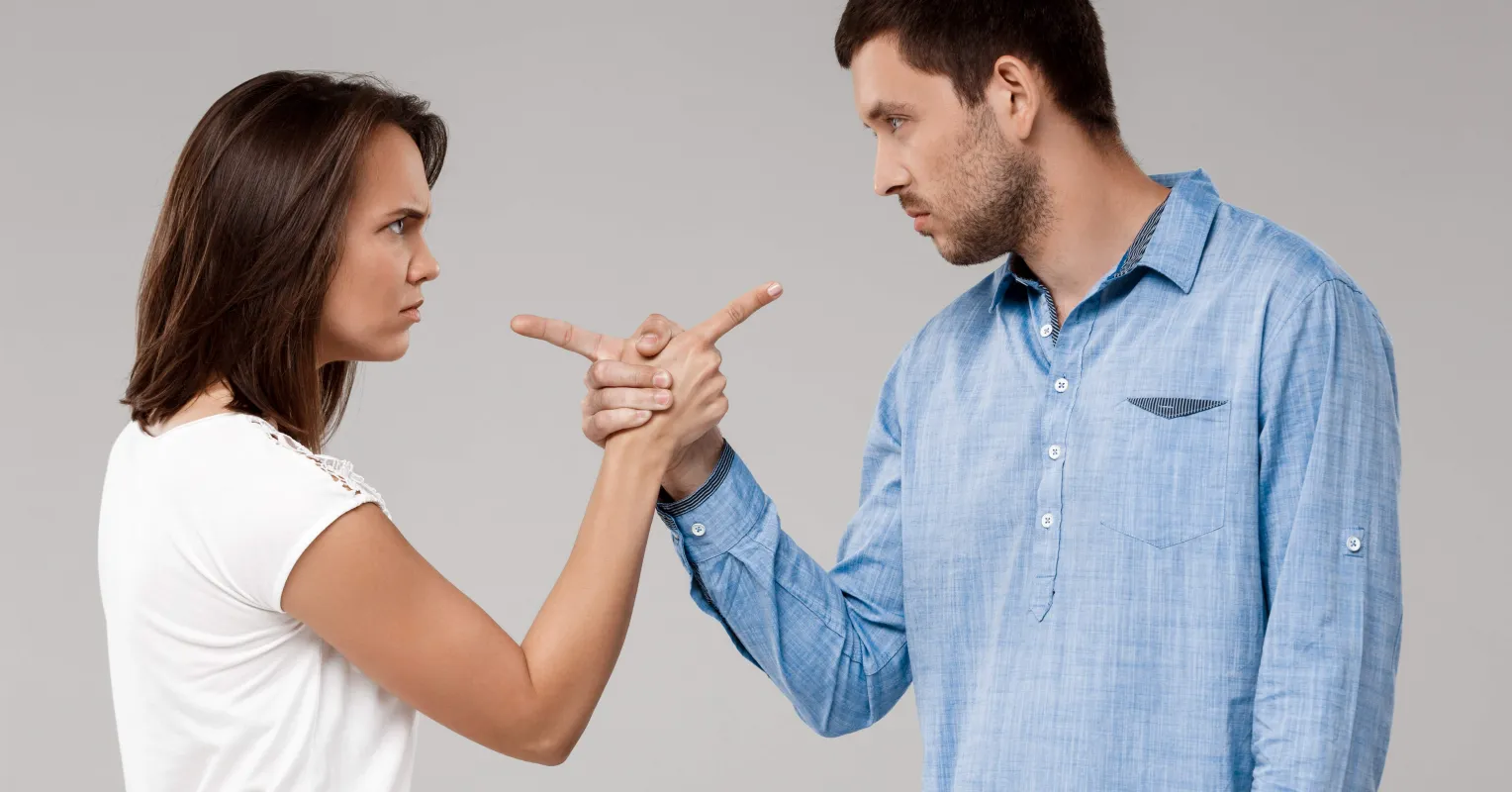 A person feeling overwhelmed providing support to their partner during a difficult moment