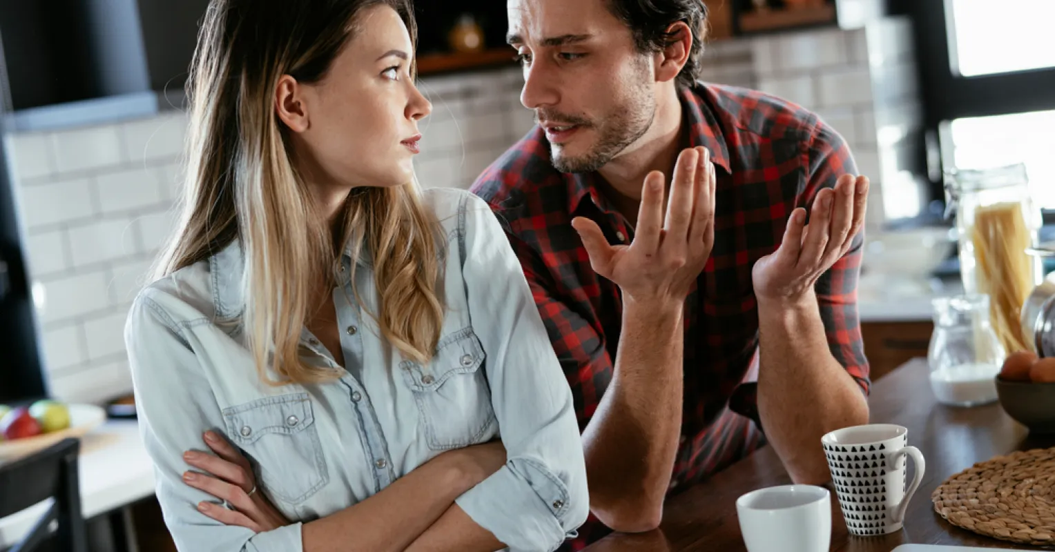 Person engaged in deep conversation, navigating feelings and over-explaining in relationships.