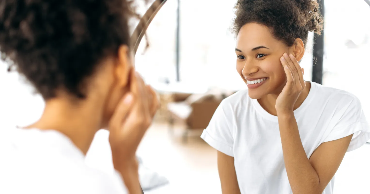 Individual contemplating self-criticism while comparing themselves to others