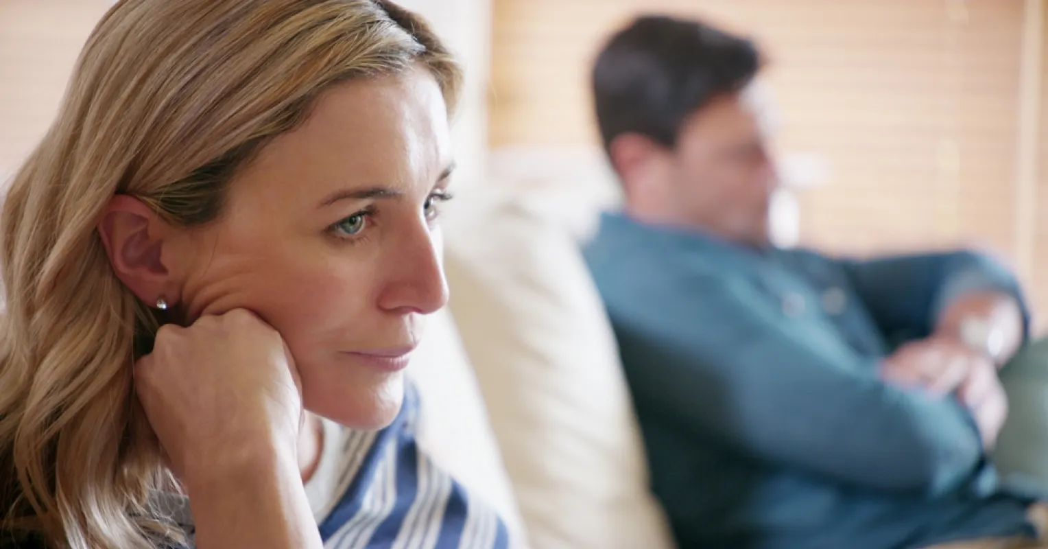 Person reflecting on uncertainty in a relationship connected to i stay in a relationship that doesnt make me
