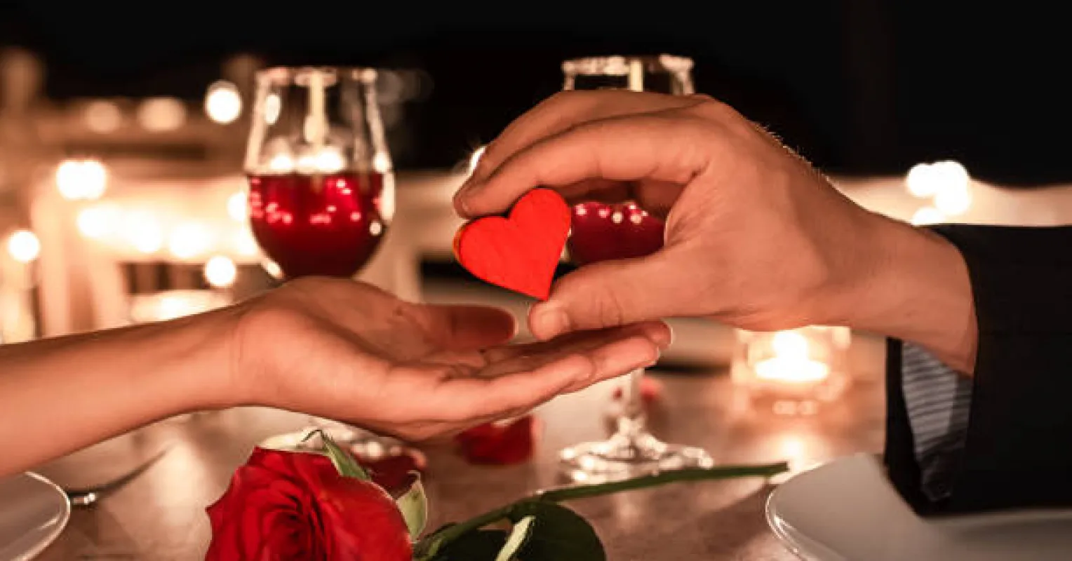 Person looking contemplative, sensing emotional distance around Valentine's Day