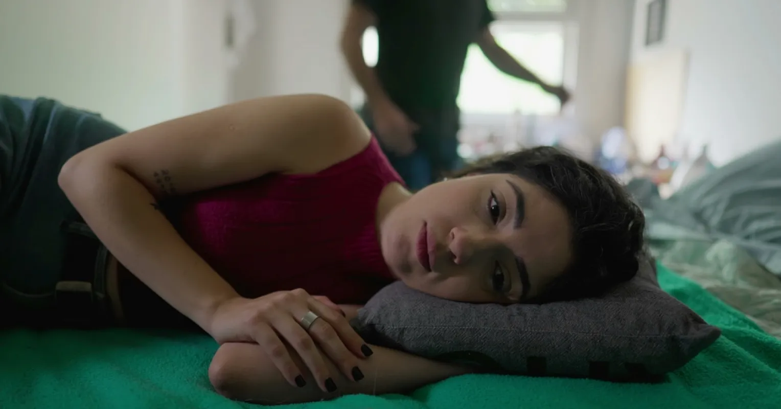 Individual pondering the difficulty of establishing boundaries in a relationship