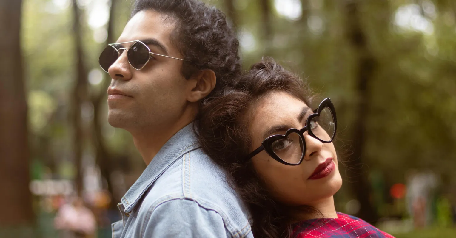 Couple engaging in a serious discussion, reflecting on recurring arguments in their relationship
