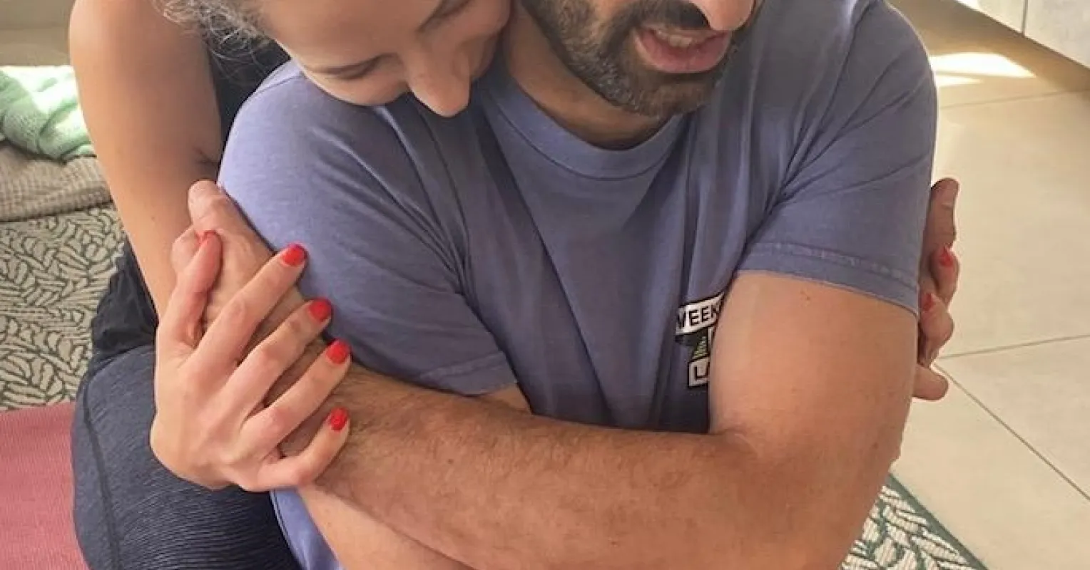 Couple sitting apart, reflecting on emotional distance after feeling close together