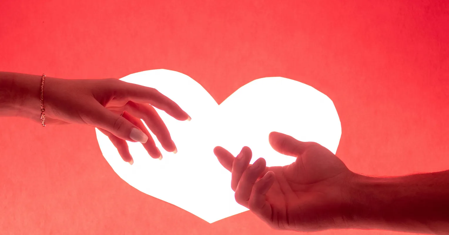 Individual experiencing anxiety about love while checking their watch, reflecting societal pressures