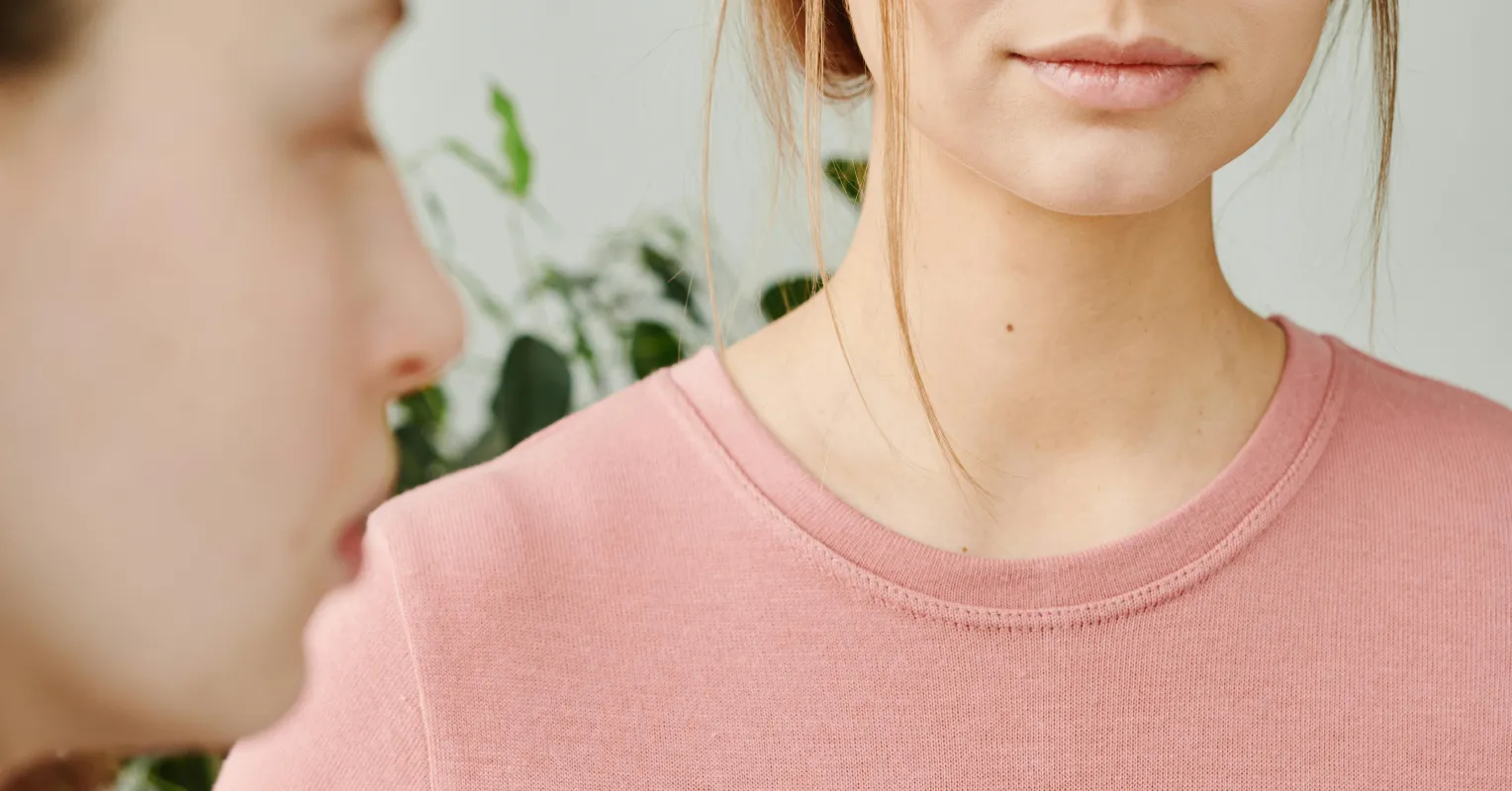 Person noticing subtle social behavior signals connected to i struggle to say no to manipulative friends