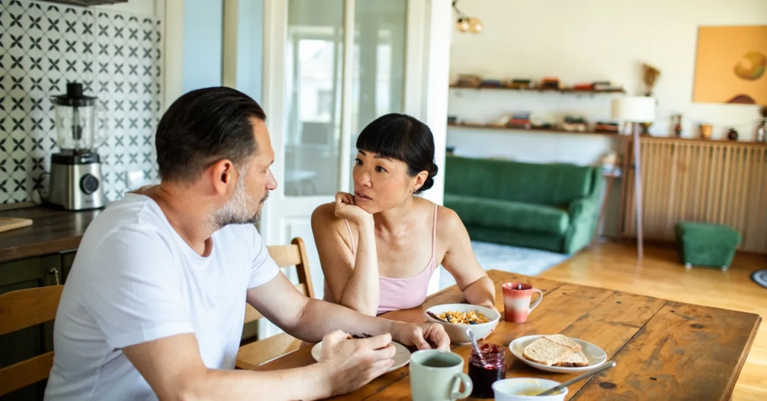 Couple navigating emotional distance during stressful times in their relationship