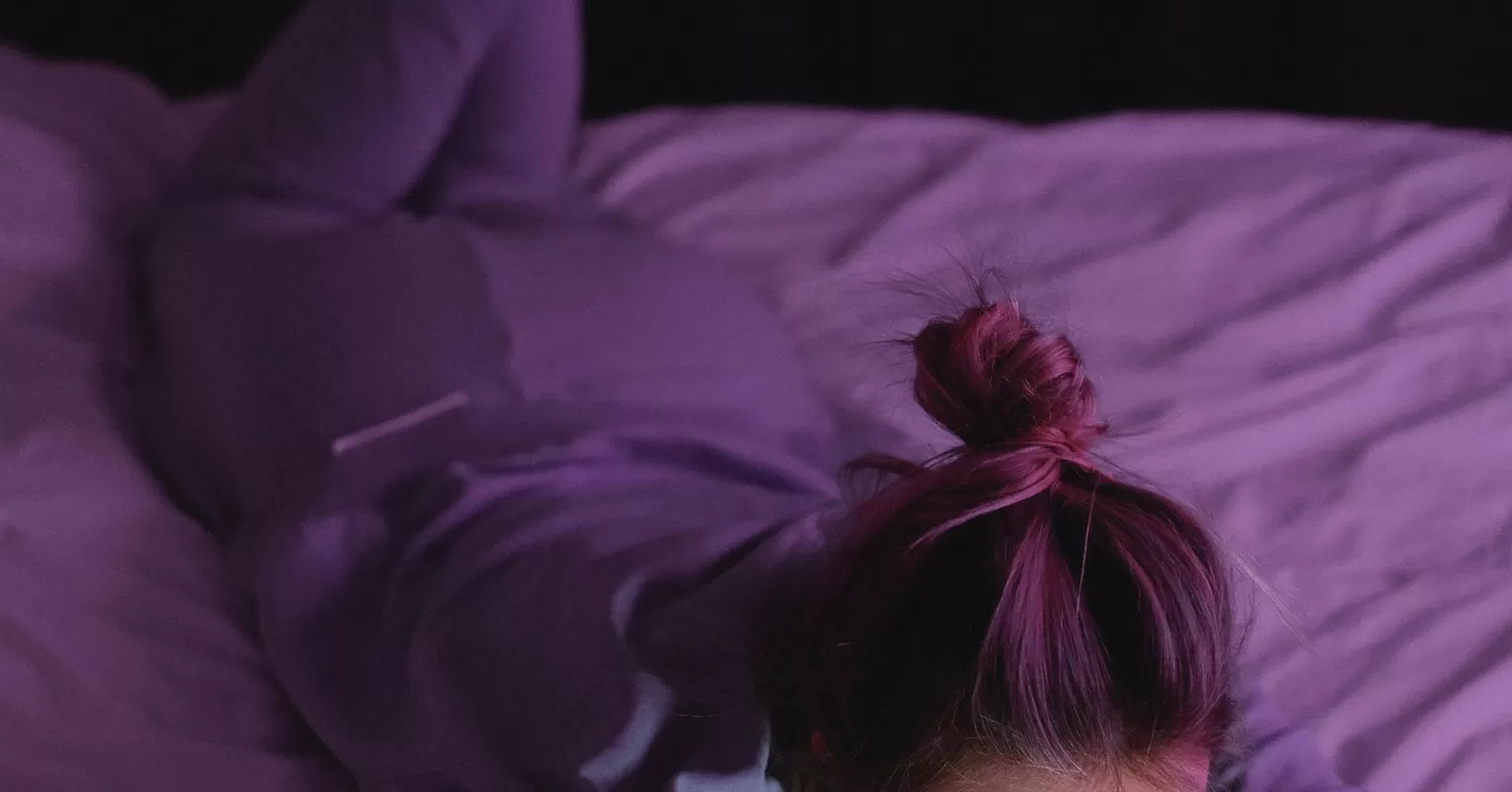 Woman contemplating common misconceptions about women who watch porn in a thoughtful setting