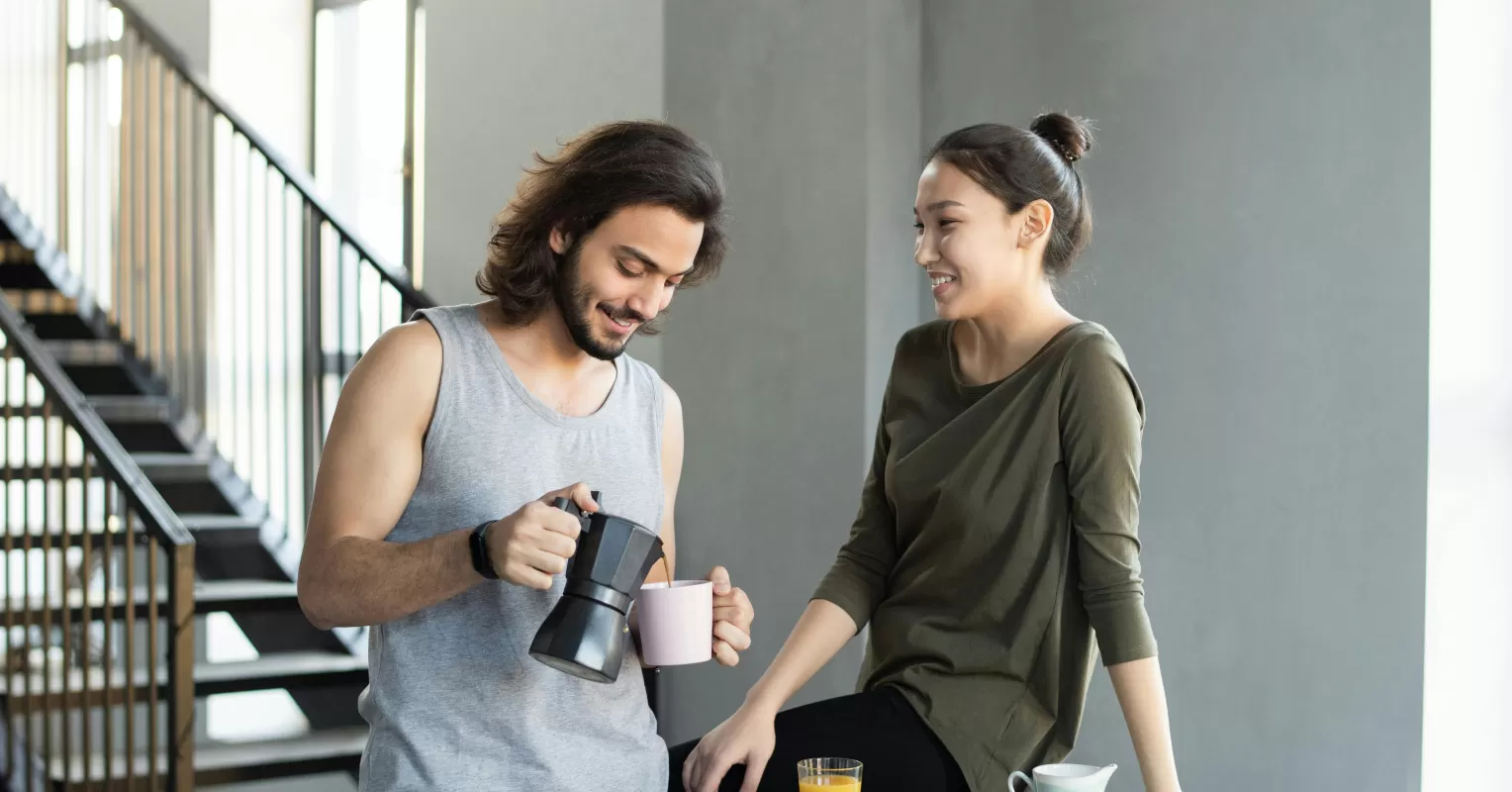 Couple engaged in a deep conversation, strengthening their relationship through meaningful questions
