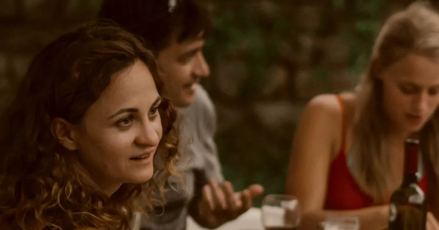Couple in conversation, reflecting on friends' opinions about their love life