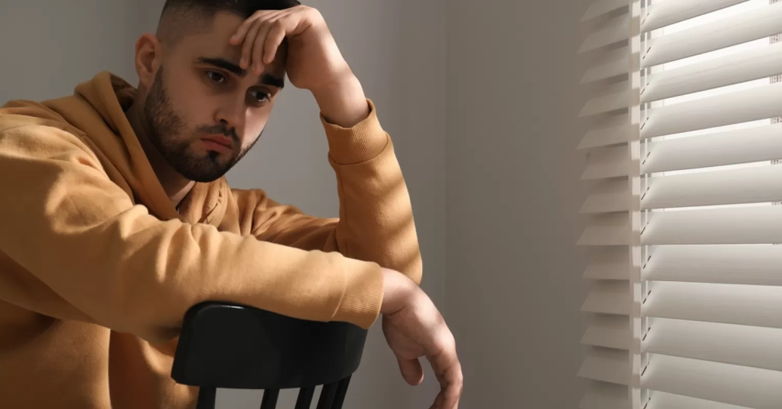 Men discussing their friendships while reflecting on emotional support in relationships