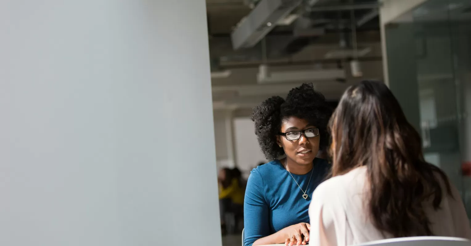 Person reflecting on uncertainty in a relationship connected to how to handle feeling threatened by my partners stepmom