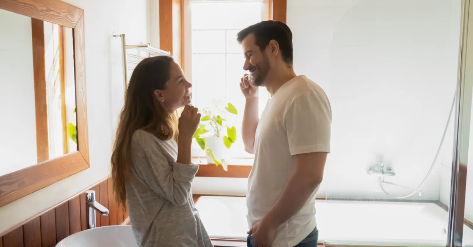 Couple sharing a joyful moment, embodying how to keep excitement alive in a long-term relationship
