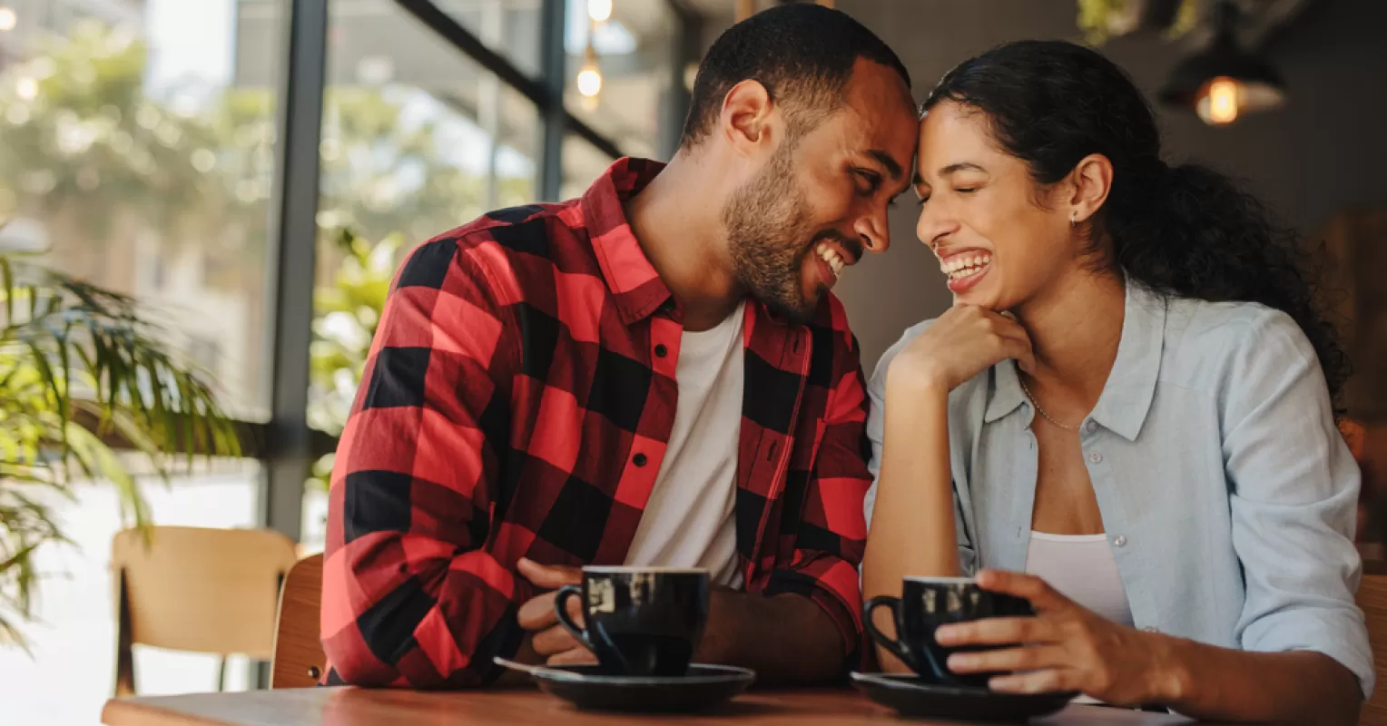 Person reflecting on uncertainty in a relationship connected to how to recognize if someone is emotionally available in