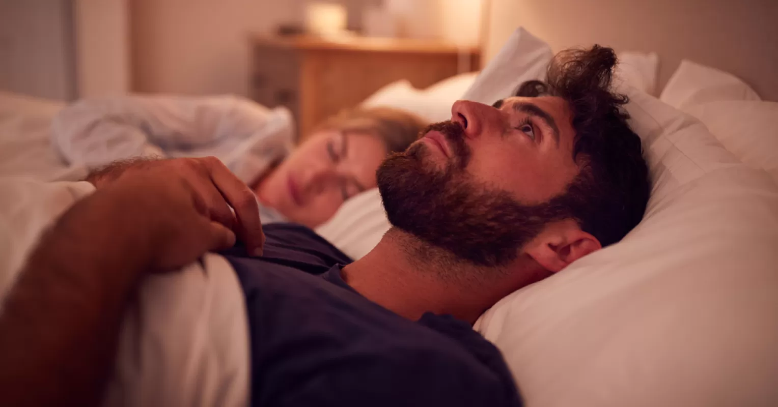 Person reflecting on uncertainty in a relationship connected to how to recognize if my partner is feeling lonely