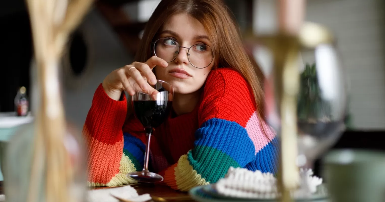 Individual contemplating self-sabotage patterns while reflecting on a relationship experience