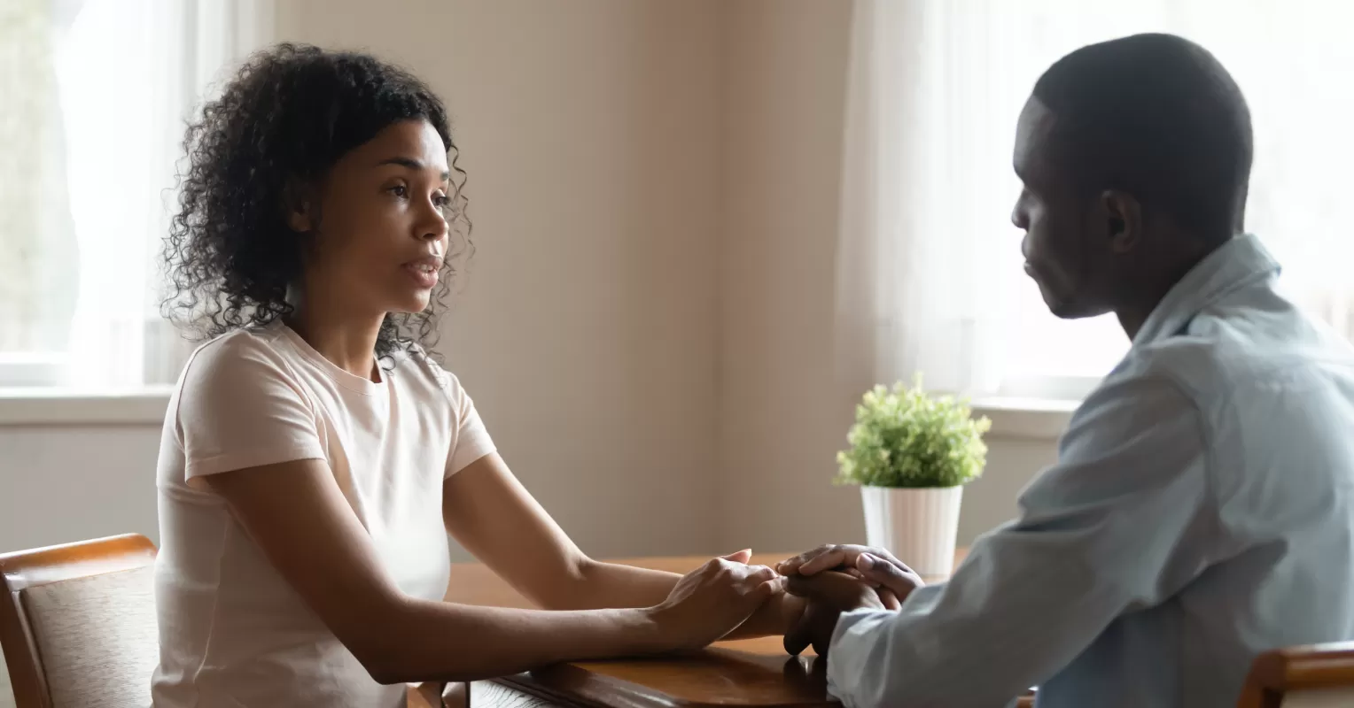 Person contemplating their feelings after being accused of unforgiving behavior in a relationship