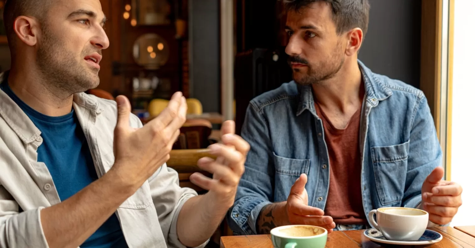 Person noticing subtle social behavior signals connected to how to transition from being acquaintances to close friends