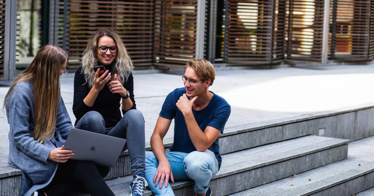 Two friends engaging in a deep conversation, breaking away from small talk awkwardness