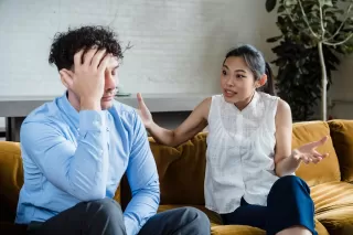 Two friends having a supportive conversation about family choices without inducing guilt