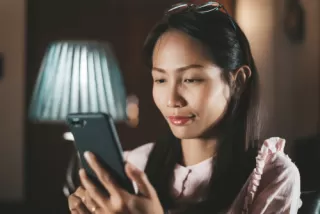 A couple engaging in a video call, highlighting preferences for virtual connections over real-life interactions