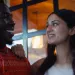 Couple sitting apart, showing signs of emotional overwhelm during a conflict