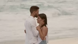 Couple having a heartfelt conversation, with one partner addressing negative behavior patterns