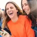 Couple laughing together, indicating strong emotional connection and relationship quality through shared laughter