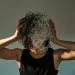 Individual contemplating dating uncertainty and mixed signals in relationships.