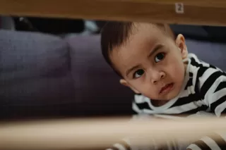 Child imagining parents reuniting, reflecting emotional responses to divorce