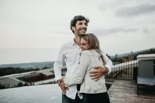 Person reflecting on uncertainty in a relationship connected to how to tell my partner what i want in